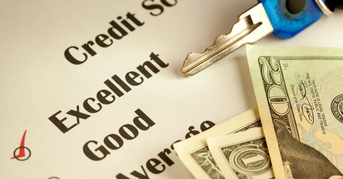 dollar bill keys and credit score document