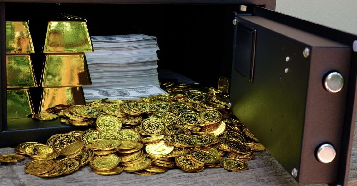 gold coins bars and cash in cold storage