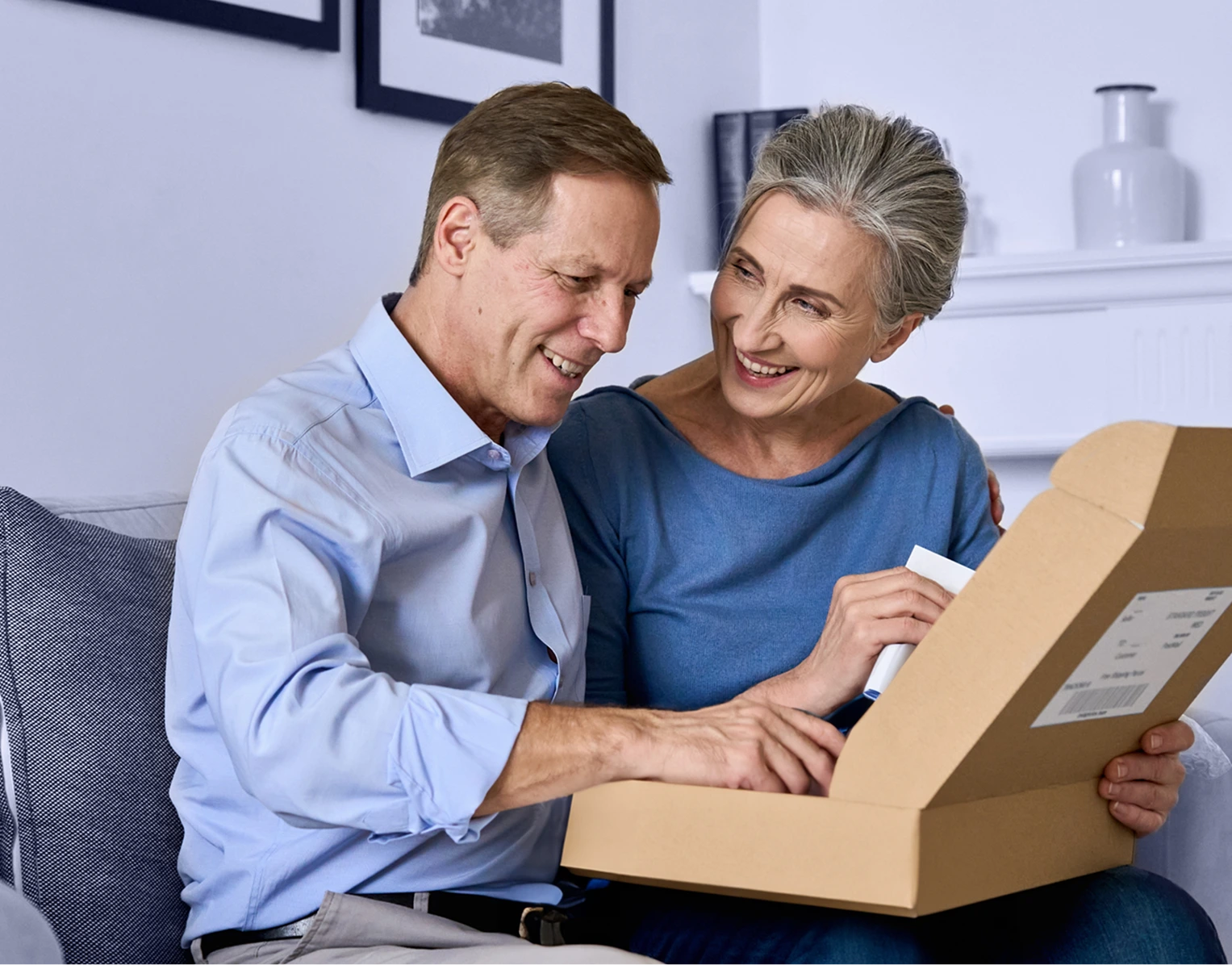 A couple unboxing their packages