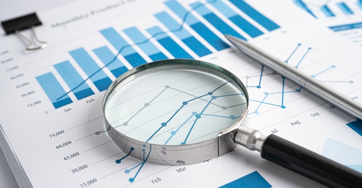 magnifying glass on top of data