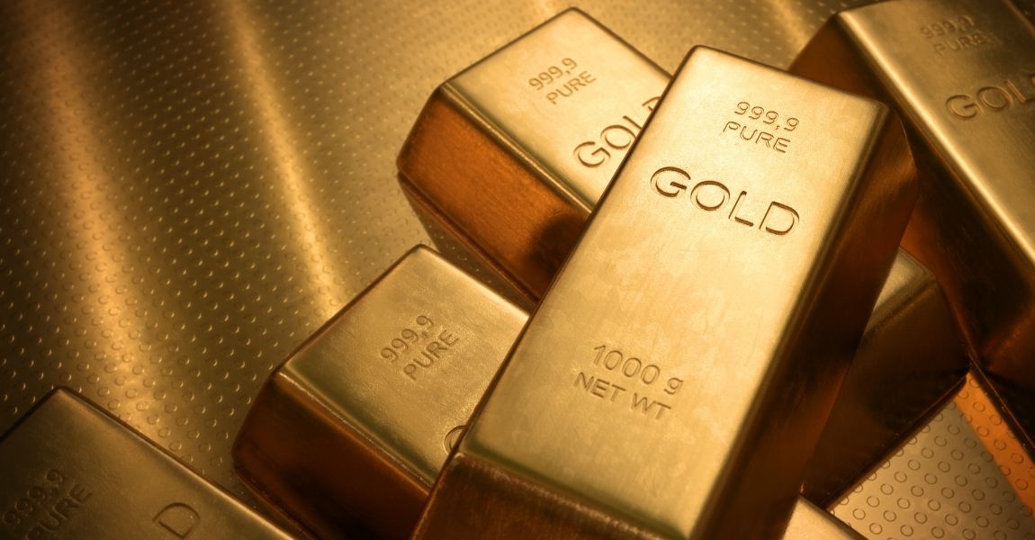three gold bars stacked with each other