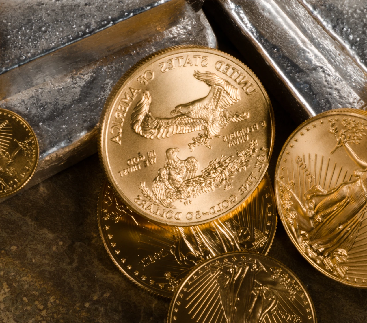 American Gold Eagle Coins with laying on Silver bar