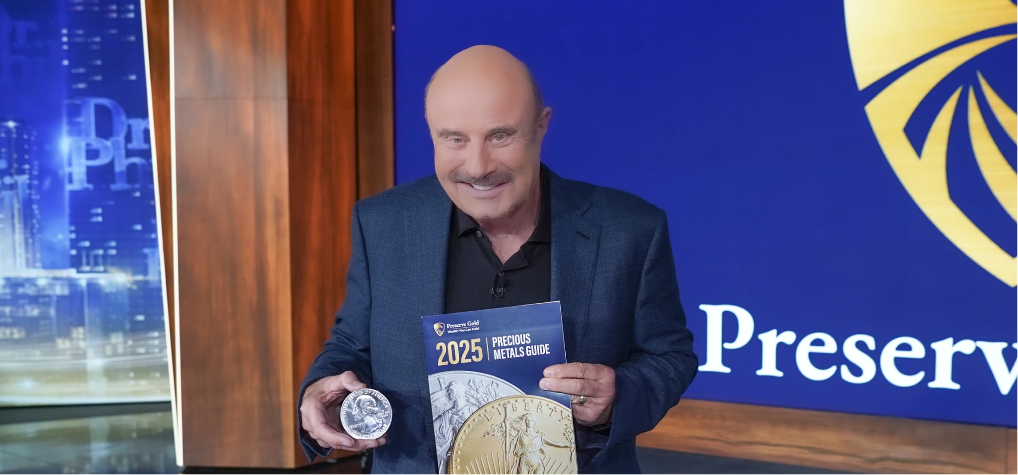 Dr. Phil holding preserve gold products